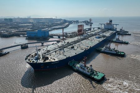 Oil prices settle down slightly on more supply in US and abroad